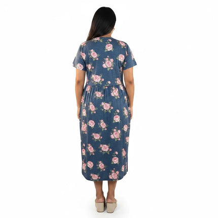 Back view of a CozyFab midi dress in blue with a pink floral print, featuring short sleeves and a relaxed fit.